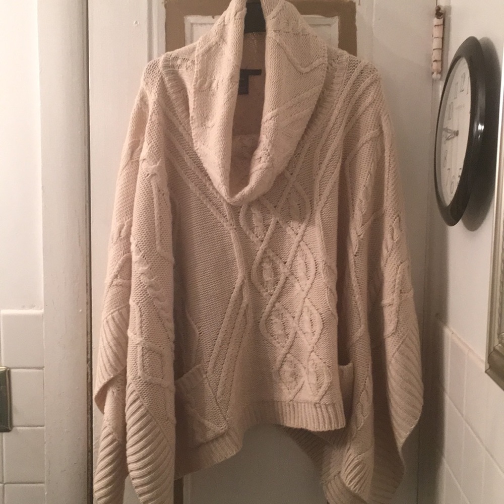 Sweater cape.